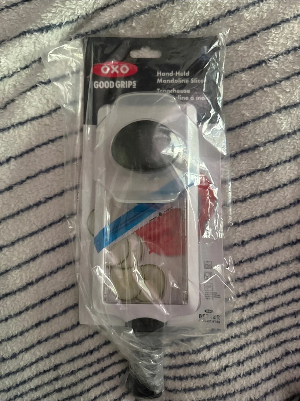 OXO White and Black Mandoline Slicer with Safety Hand Guard